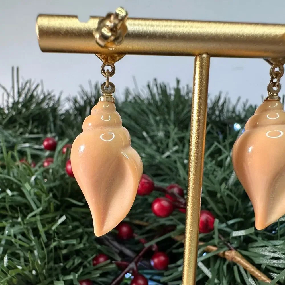 Conch stud earrings